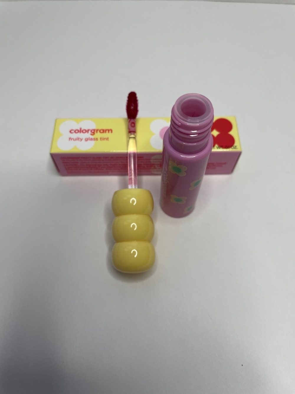 NIB Cologram Fruity Glass Tint Lip Gloss.  Lovely raspberry #08.
